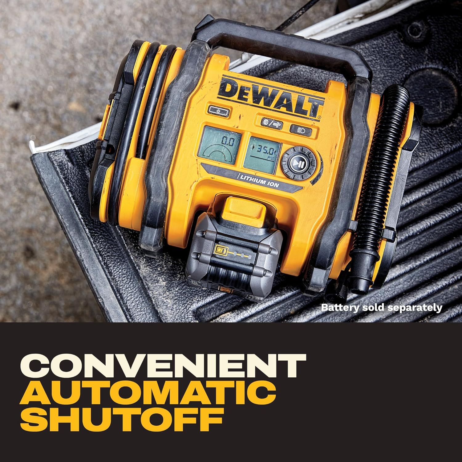 The inflator in a truck bed with a battery pack fitted and the digital gauge reading 35.0 psi